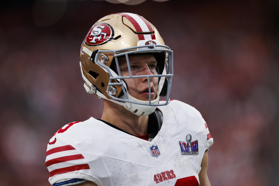 LAS VEGAS, NEVADA - FEBRUARY 11: Christian McCaffrey #23 of the San Francisco 49ers looks on from the sideline before Super Bowl LVIII against the Kansas City Chiefs at Allegiant Stadium on February 11, 2024 in Las Vegas, Nevada. (Photo by Ryan Kang/Getty Images)