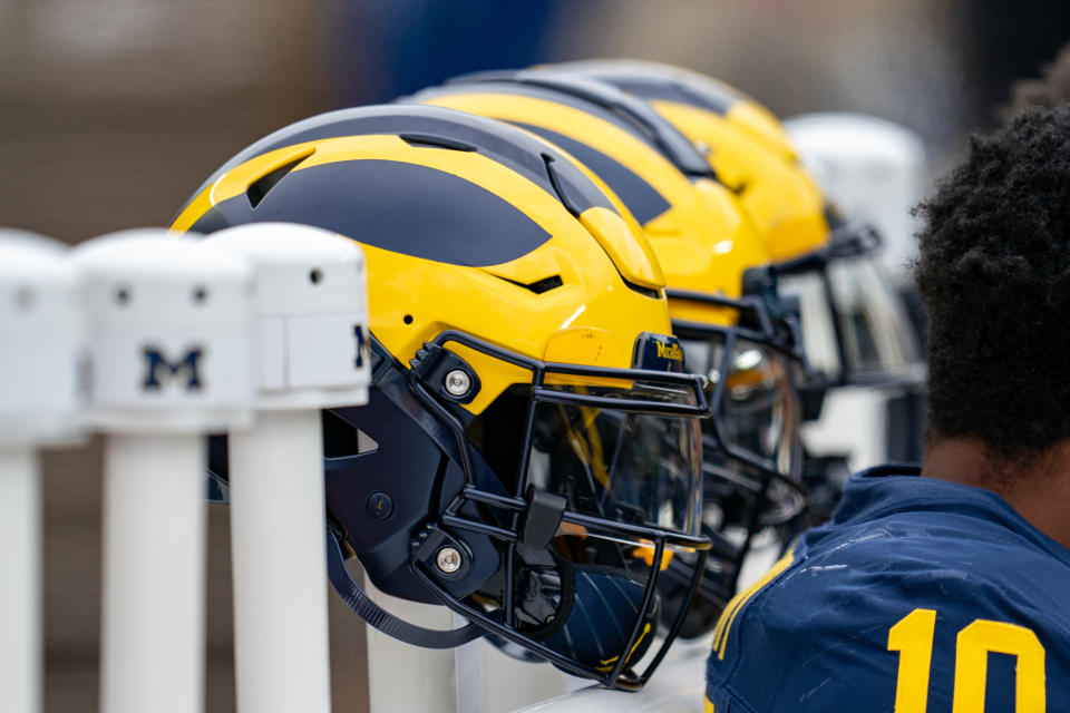 ANN ARBOR, MICHIGAN - APRIL 20: Michigan Football helmets displayed behind the Blue Team bench during the Michigan Football Spring Game at Michigan Stadium on April 20, 2024 in Ann Arbor, Michigan. (Photo by Jaime Crawford/Getty Images)