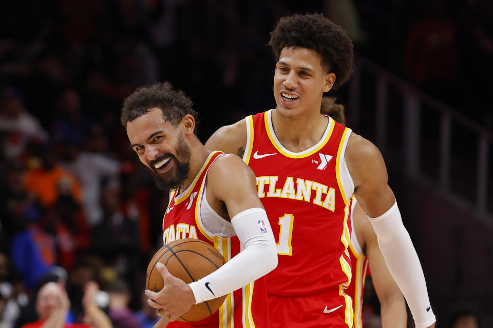 ATLANTA, GEORGIA - NOVEMBER 6: Trae Young #11 and Jalen Johnson #1 of the Atlanta Hawks react late in the fourth quarter against the New York Knicks at State Farm Arena on November 6, 2024 in Atlanta, Georgia. NOTE TO USER: User expressly acknowledges and agrees that, by downloading and or using this photograph, User is consenting to the terms and conditions of the Getty Images License Agreement. (Photo by Todd Kirkland/Getty Images)