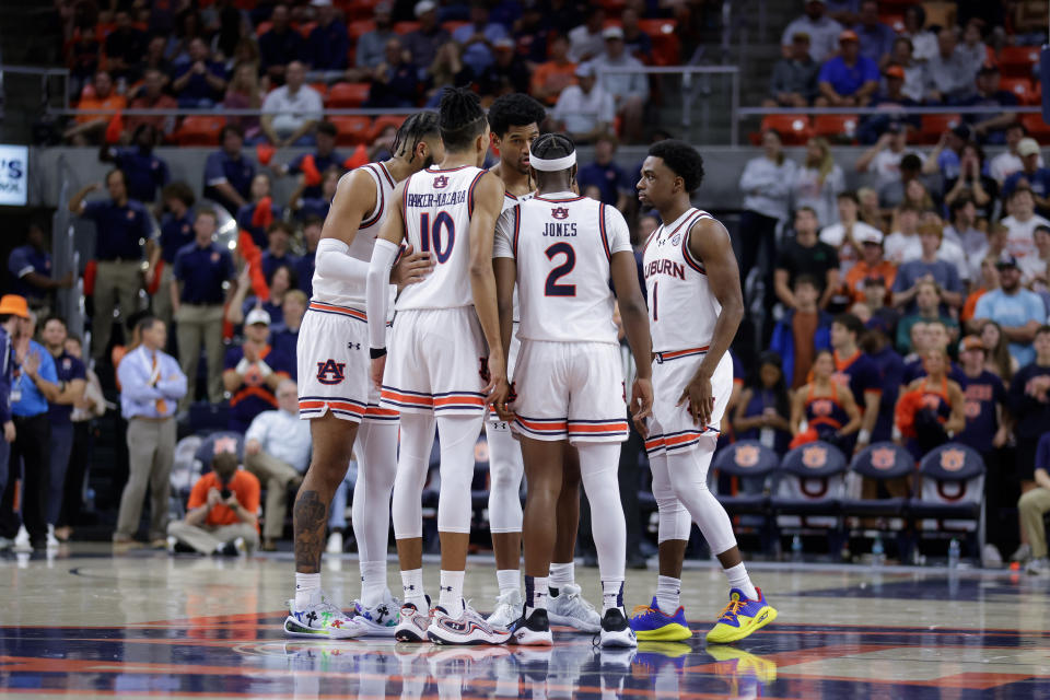 AUBURN, ALABAMA - NOVEMBER 6: The Auburn Tigers huddle up during the second half against the Vermont Catamountsat Neville Arena on November 6, 2024 in Auburn, Alabama. (Photo by Stew Milne/Getty Images)