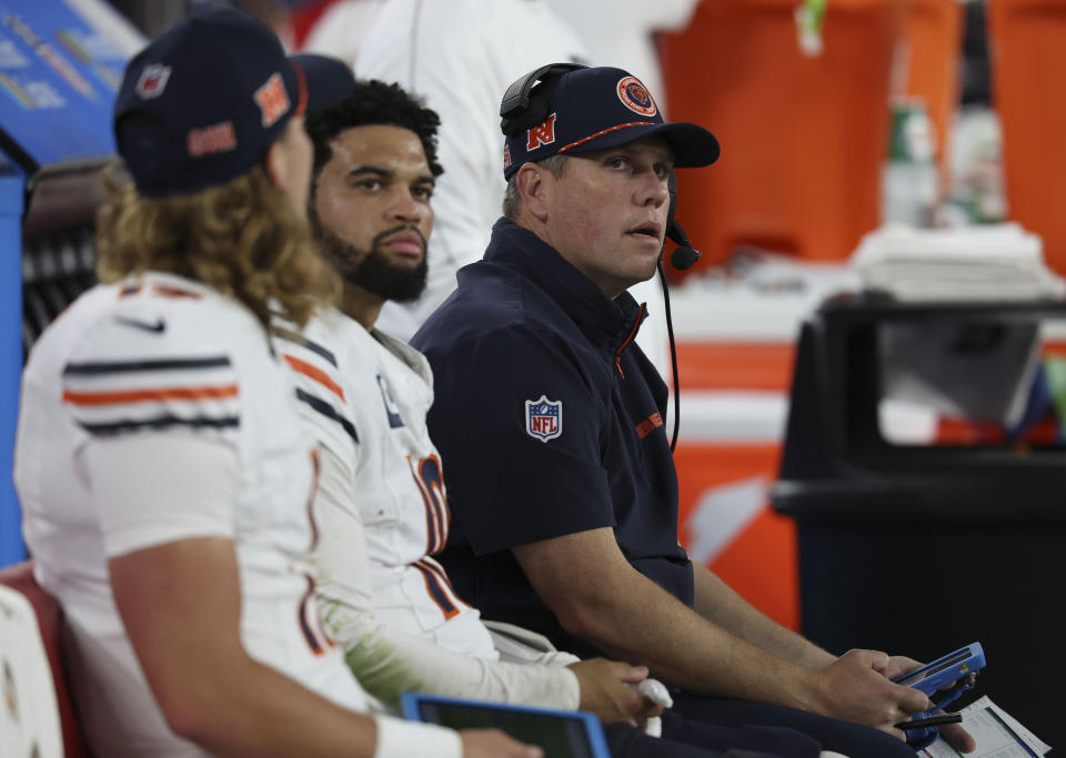 Bears offensive coordinator Shane Waldron and quarterback Caleb Williams sit together on the bench. Waldron was fired on Monday. (Brian Cassella/Chicago Tribune/Tribune News Service via Getty Images)