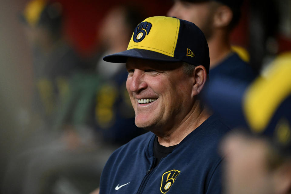 PHOENIX, ARIZONA - SEPTEMBER 13: Manager Pat Murphy #21 of the Milwaukee Brewers looks on from the dugout against the Arizona Diamondbacks at Chase Field on September 13, 2024 in Phoenix, Arizona. (Photo by Norm Hall/Getty Images)