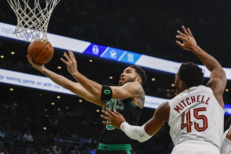 BOSTON, MASSACHUSETTS - NOVEMBER 19: Jayson Tatum #0 of the Boston Celtics shoots against Donovan Mitchell #45 of the Cleveland Cavaliers during the first quarter of the Emirates NBA Cup at TD Garden on November 19, 2024 in Boston, Massachusetts. NOTE TO USER: User expressly acknowledges and agrees that, by downloading and or using this photograph, User is consenting to the terms and conditions of the Getty Images License Agreement. (Photo by Winslow Townson/Getty Images)