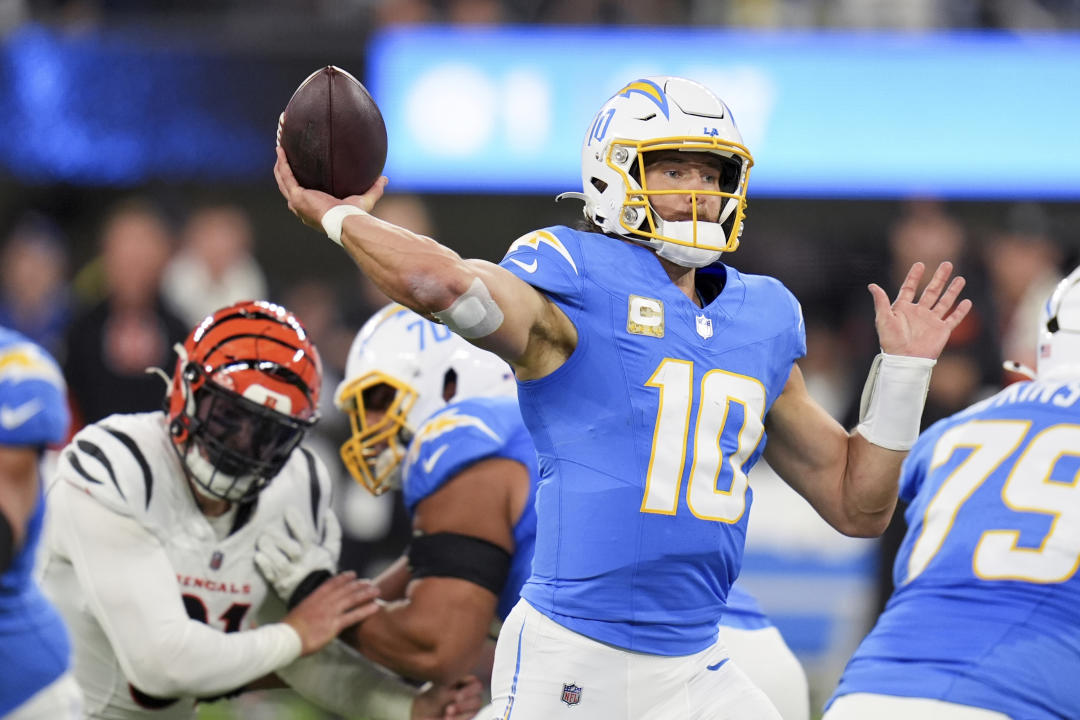 Los Angeles Chargers quarterback Justin Herbert (10) throws a pass during the first half of an NFL football game against the Cincinnati Bengals, Sunday, Nov. 17, 2024, in Inglewood, Calif. (AP Photo/Gregory Bull)