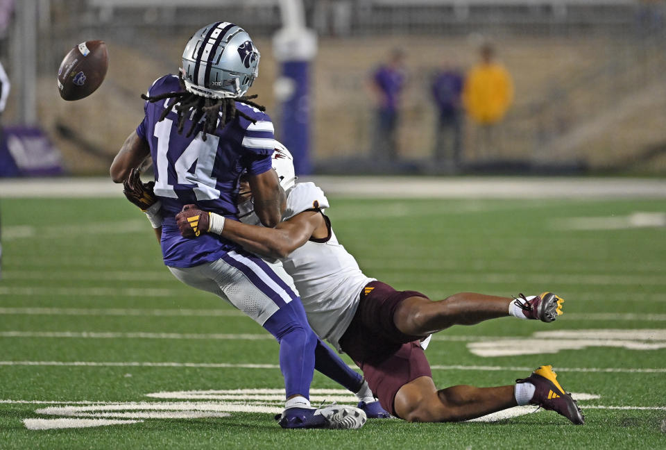 MANHATTAN, KS - NOVEMBER 16: Defensive back Keith Abney II #1 of the Arizona State Sun Devils knocks the ball loose from wide receiver Dante Cephas #14 of the Kansas State Wildcats in the second half at Bill Snyder Family Football Stadium on November 16, 2024 in Manhattan, Kansas. (Photo by Peter Aiken/Getty Images)