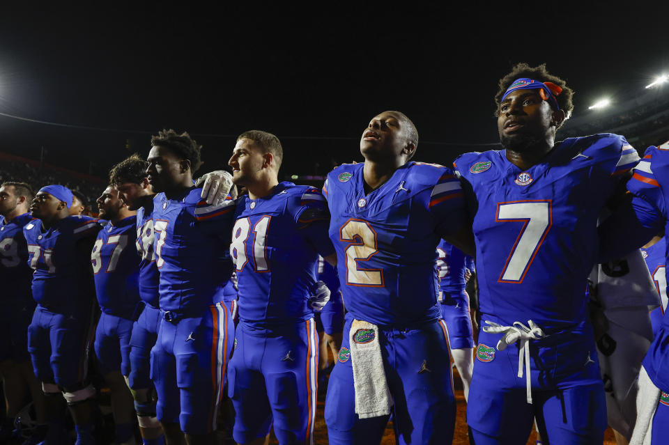 GAINESVILLE, FL - NOVEMBER 16: Florida Gators quarterback DJ Lagway (2) lines up with teammates during the school fight song after the game between the LSU Tigers and the Florida Gators on November 16, 2024 at Ben Hill Griffin Stadium at Florida Field in Gainesville, Fl. (Photo by David Rosenblum/Icon Sportswire via Getty Images)