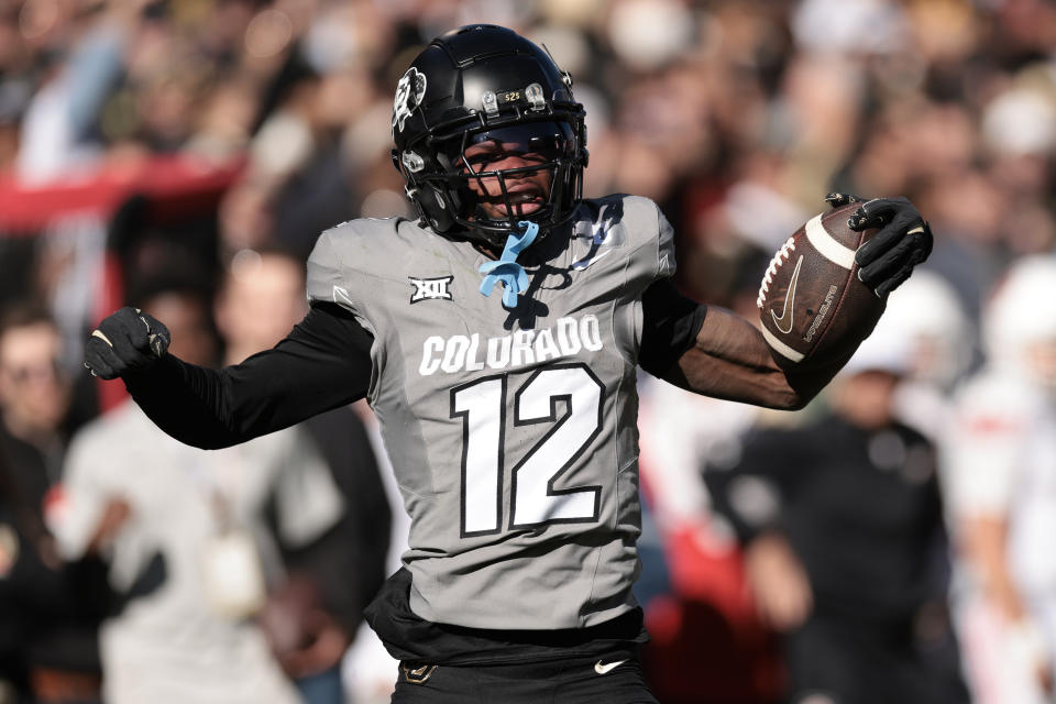 BOULDER, COLORADO - NOVEMBER 16: Travis Hunter #12 of Colorado Buffaloes celebrates catching a pass during the second quarter against the Utah Utes at Folsom Field on November 16, 2024 in Boulder, Colorado. (Photo by Andrew Wevers/Getty Images)