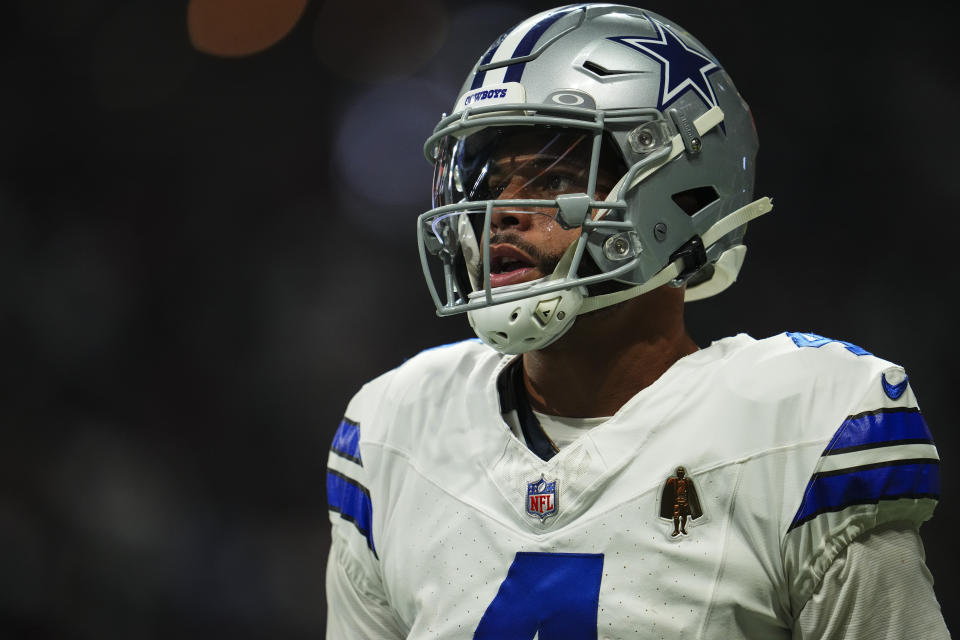 ATLANTA, GA - NOVEMBER 03: Dak Prescott #4 of the Dallas Cowboys looks on from the field during an NFL football game against the Atlanta Falcons at Mercedes-Benz Stadium on November 3, 2024 in Atlanta, Georgia. (Photo by Cooper Neill/Getty Images)