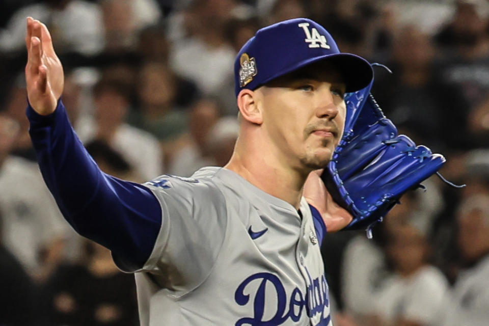 Bronx, New York, Wednesday, October 30, 2024 - Los Angeles Dodgers pitcher Walker Buehler (21) looks to the dugout the moment striking out the New York Yankees outfielder Alex Verdugo to seal a series clinching 7-6 win in Game five of the World Series at Yankee Stadium. (Robert Gauthier/Los Angeles Times via Getty Images)