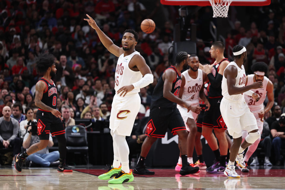 CHICAGO, ILLINOIS - NOVEMBER 11: Donovan Mitchell #45 of the Cleveland Cavaliers celebrates making a three-point shot during the second quarter against the Chicago Bulls at the United Center on November 11, 2024 in Chicago, Illinois. NOTE TO USER: User expressly acknowledges and agrees that, by downloading and or using this photograph, User is consenting to the terms and conditions of the Getty Images License Agreement. (Photo by Geoff Stellfox/Getty Images)