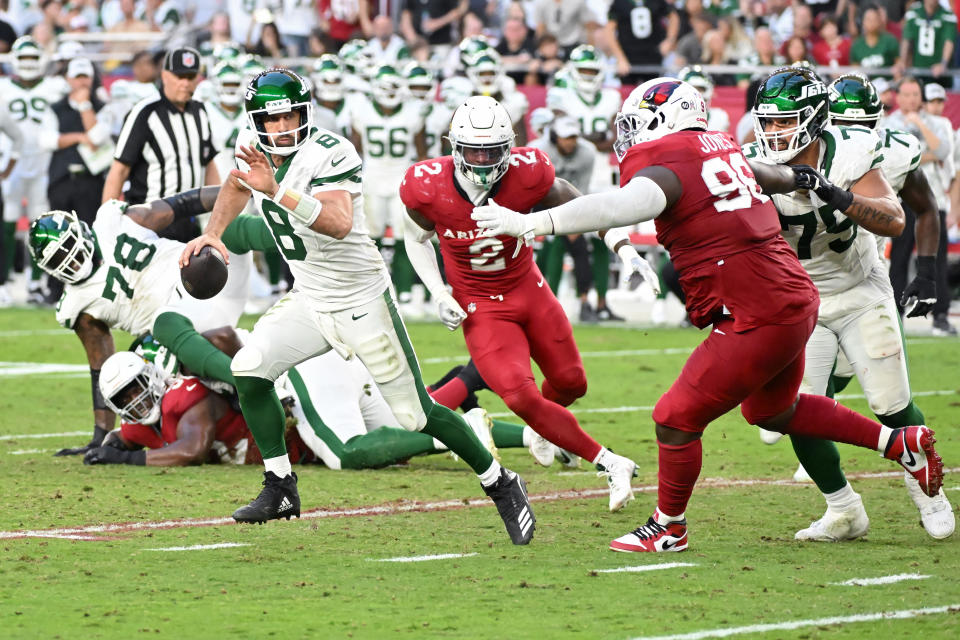 Aaron Rodgers passed for 151 yards on 22 completions in Sunday's blowout loss to the Cardinals. (Photo by Norm Hall/Getty Images)