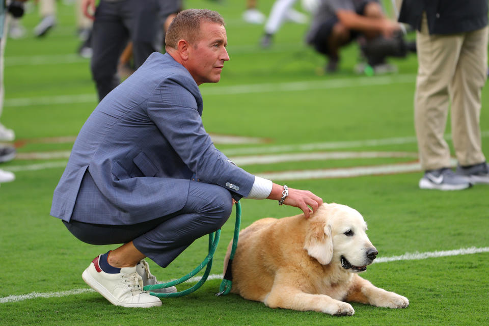 TUSCALOOSA, ALABAMA - SEPTEMBER 28: ESPN sportscaster Kirk Herbstreit and his dog Ben look on before the game between the Alabama Crimson Tide and the Georgia Bulldogs at Bryant-Denny Stadium on September 28, 2024 in Tuscaloosa, Alabama. (Photo by Kevin C. Cox/Getty Images)