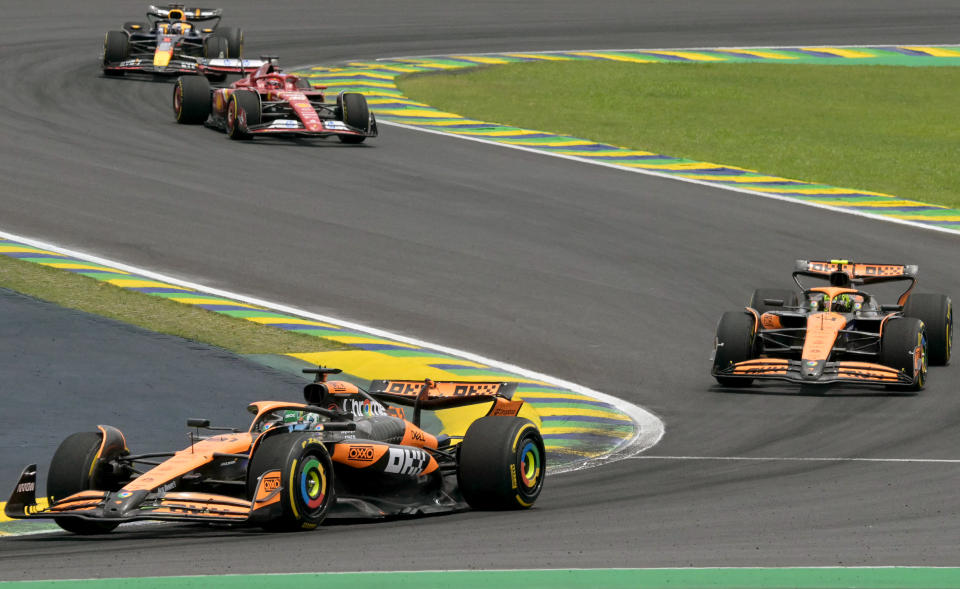 (Front ot back) McLaren's Australian driver Oscar Piastri, McLaren's British driver Lando Norris, Ferrari's Monegasque driver Charles Leclerc, and Red Bull Racing's Dutch driver Max Verstappen compete during the Sprint race at the Jose Carlos Pace racetrack, aka Interlagos, in Sao Paulo, Brazil, on November 2, 2024, on the eve of the Formula One Sao Paulo Grand Prix. (Photo by NELSON ALMEIDA / AFP) (Photo by NELSON ALMEIDA/AFP via Getty Images)