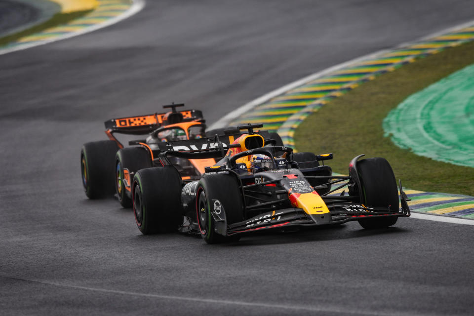 Max Verstappen of Red Bull Racing RB20 and Oscar Piastri of McLaren F1 Team MCL38 compete during the Formula 1 Grand Prix of Brazil at Autodromo Jose Carlos Pace in Sao Paulo, Brazil, on October 31 to November 3, 2024. (Photo by Gongora/NurPhoto via Getty Images)