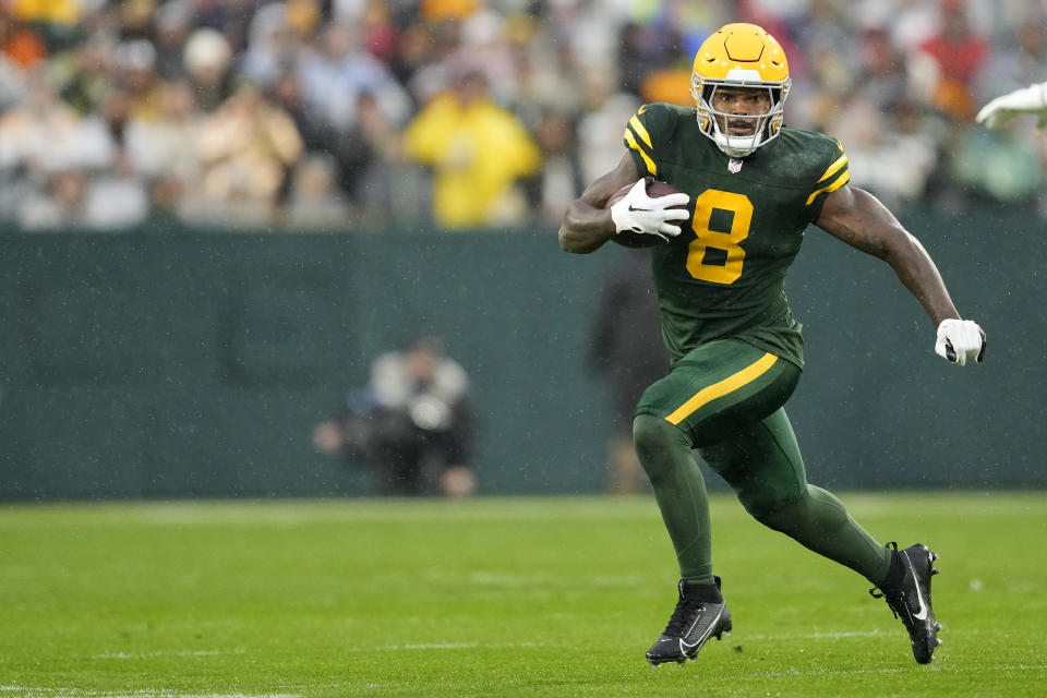 GREEN BAY, WISCONSIN - NOVEMBER 03: Josh Jacobs #8 of the Green Bay Packers runs with the ball against the Detroit Lions during the first half of a game at Lambeau Field on November 03, 2024 in Green Bay, Wisconsin. (Photo by Patrick McDermott/Getty Images)