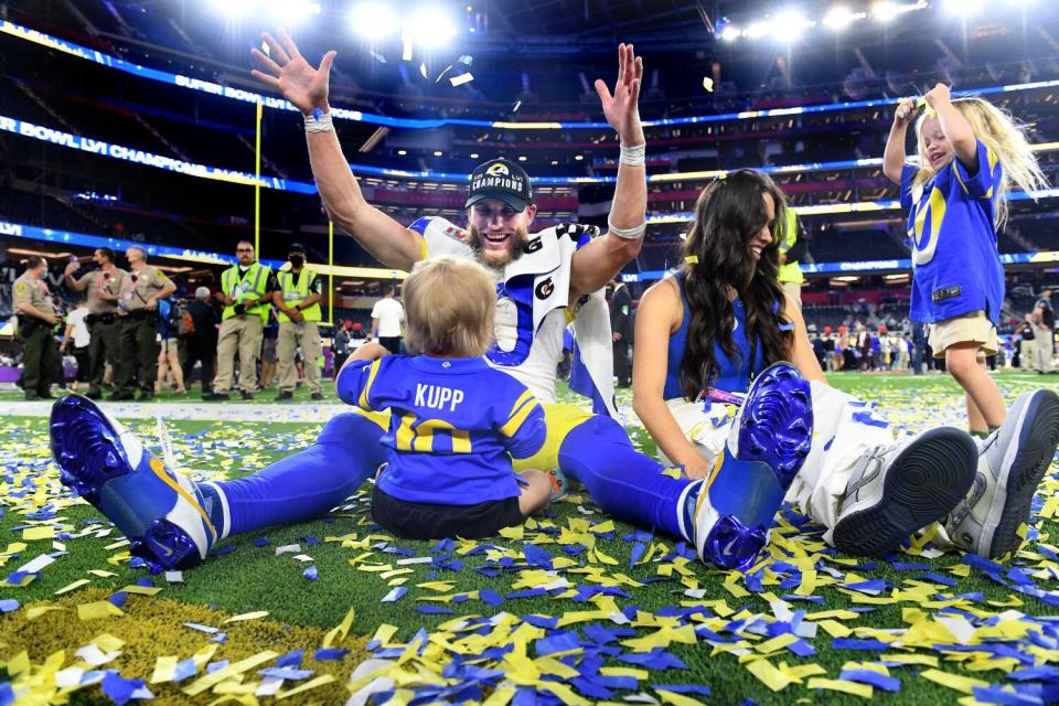 Rams wide receiver Cooper Kupp celebrates with his family after Super Bowl LVI at SoFi Stadium.