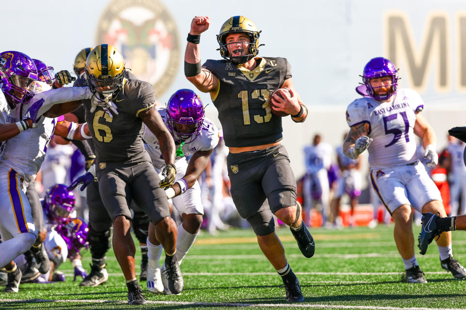 WEST POINT, NEW YORK - OCTOBER 19: Bryson Daily #13 of the Army Black Knights celebrates as he scores a touchdown during the second half of a football game against the East Carolina Pirates at Michie Stadium on October 19, 2024 in West Point, New York. (Photo by David Jensen/Getty Images)