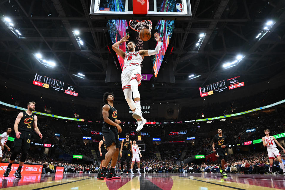 CLEVELAND, OHIO - NOVEMBER 15: Zach LaVine #8 of the Chicago Bulls dunks over Isaac Okoro #35 of the Cleveland Cavaliers during the second quarter of the Emirates NBA Cup game at Rocket Mortgage Fieldhouse on November 15, 2024 in Cleveland, Ohio. The Cavaliers defeated the Bulls 144-126. NOTE TO USER: User expressly acknowledges and agrees that, by downloading and or using this photograph, User is consenting to the terms and conditions of the Getty Images License Agreement. (Photo by Jason Miller/Getty Images)