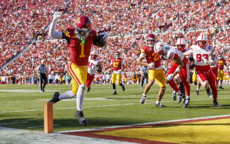 USC wide receiver Zachariah Branch scores on a touchdown reception in the first half Saturday against Nebraska.