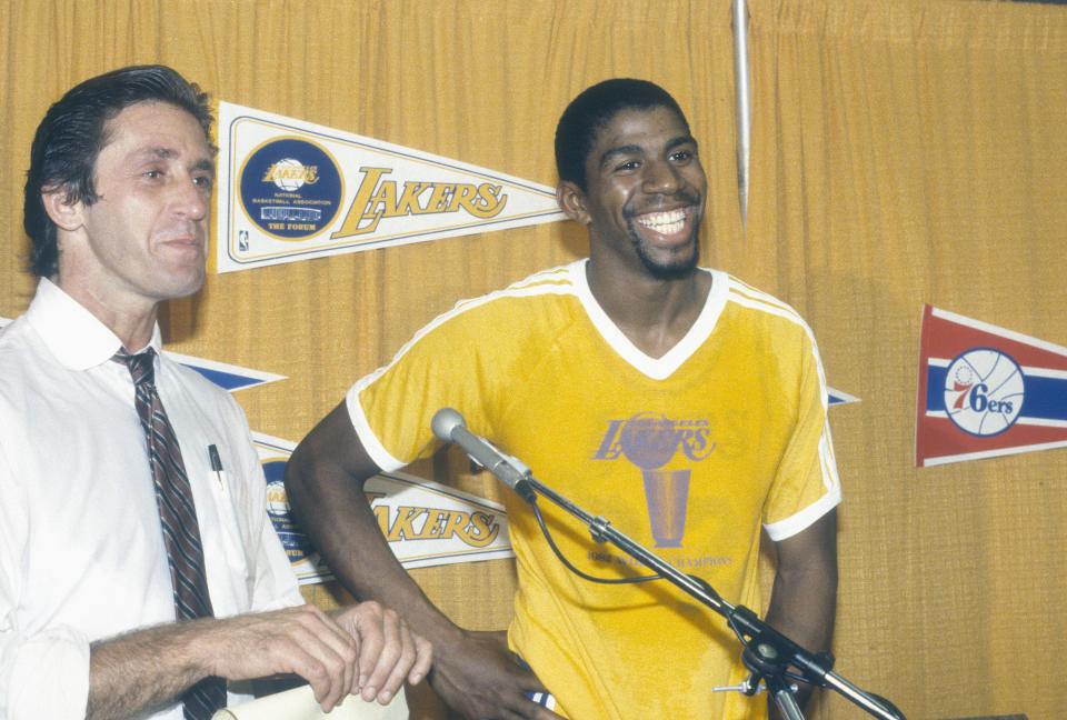 INGLEWOOD, CA - CIRCA 1982: Head Coach Pat Riley and Magic Johnson #32 of the Los Angeles Lakers talks to the media after an NBA basketball game circa 1982 at The Forum in Inglewood, California. Riley coached the Lakers from 1981-1990. (Photo by Focus on Sport/Getty Images) *** Local Caption *** Pat Riley; Magic Johnson