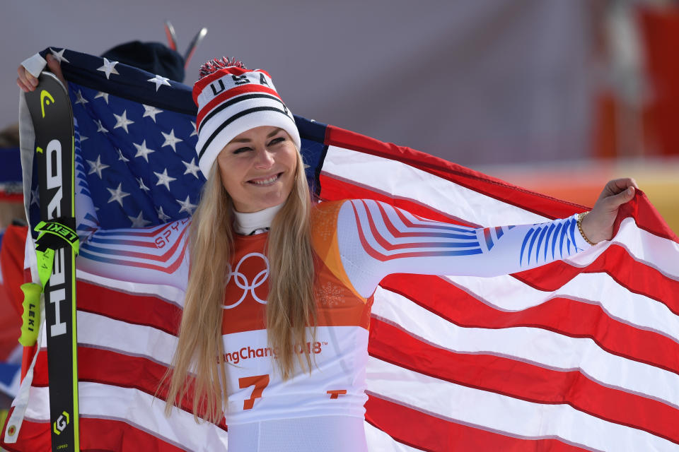 PYEONGCHANG-GUN, SOUTH KOREA - FEBRUARY 21: Bronze medallist Lindsey Vonn of the United States celebrates during the victory ceremony for the Ladies' Downhill on day 12 of the PyeongChang 2018 Winter Olympic Games at Jeongseon Alpine Centre on February 21, 2018 in Pyeongchang-gun, South Korea. (Photo by Matthias Hangst/Getty Images)