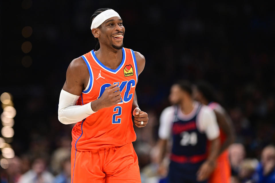 OKLAHOMA CITY, OKLAHOMA - NOVEMBER 11: Shai Gilgeous-Alexander #2 of the Oklahoma City Thunder flashes a smile during the first half against the Los Angeles Clippers at Paycom Center on November 11, 2024 in Oklahoma City, Oklahoma. NOTE TO USER: User expressly acknowledges and agrees that, by downloading and or using this photograph, User is consenting to the terms and conditions of the Getty Images License Agreement. (Photo by Joshua Gateley/Getty Images)