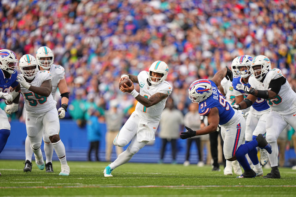 Football: Miami Dolphins Tua Tagovailoa (1) in action, runs with the football vs Buffalo Bills at Highmark Stadium.
Orchard Park, NY 11/3/2024 CREDIT: Erick W. Rasco (Photo by Erick W. Rasco/Sports Illustrated via Getty Images) (Set Number: X164637 TK1)