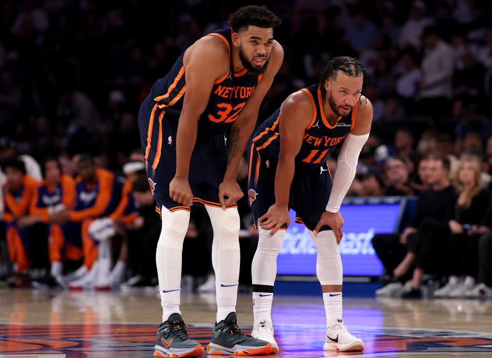 NEW YORK, NEW YORK - NOVEMBER 08: Karl-Anthony Towns #32 and Jalen Brunson #11 of the New York Knicks talk during a free throw by a teammate in the second half against the Milwaukee Bucks at Madison Square Garden on November 08, 2024 in New York City. NOTE TO USER: User expressly acknowledges and agrees that, by downloading and or using this photograph, User is consenting to the terms and conditions of the Getty Images License Agreement. (Photo by Elsa/Getty Images)