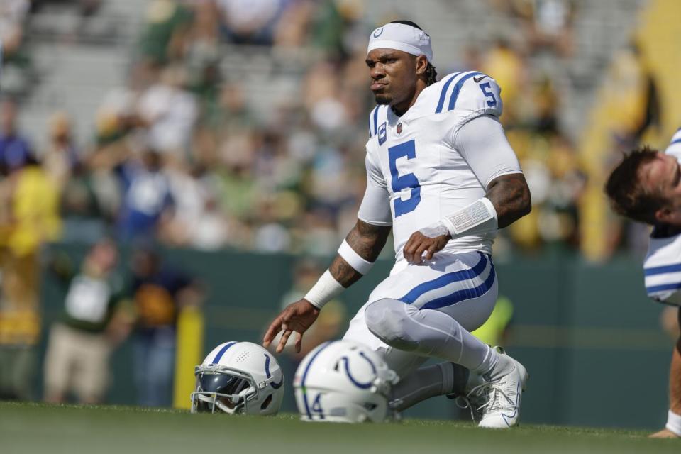 Indianapolis Colts quarterback Anthony Richardson (5) stretches in warm ups/