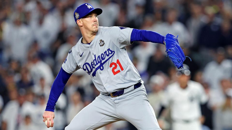 Oct 30, 2024; New York, New York, USA; Los Angeles Dodgers pitcher Walker Buehler (21) pitches during the ninth inning against the New York Yankees in game four of the 2024 MLB World Series at Yankee Stadium. 