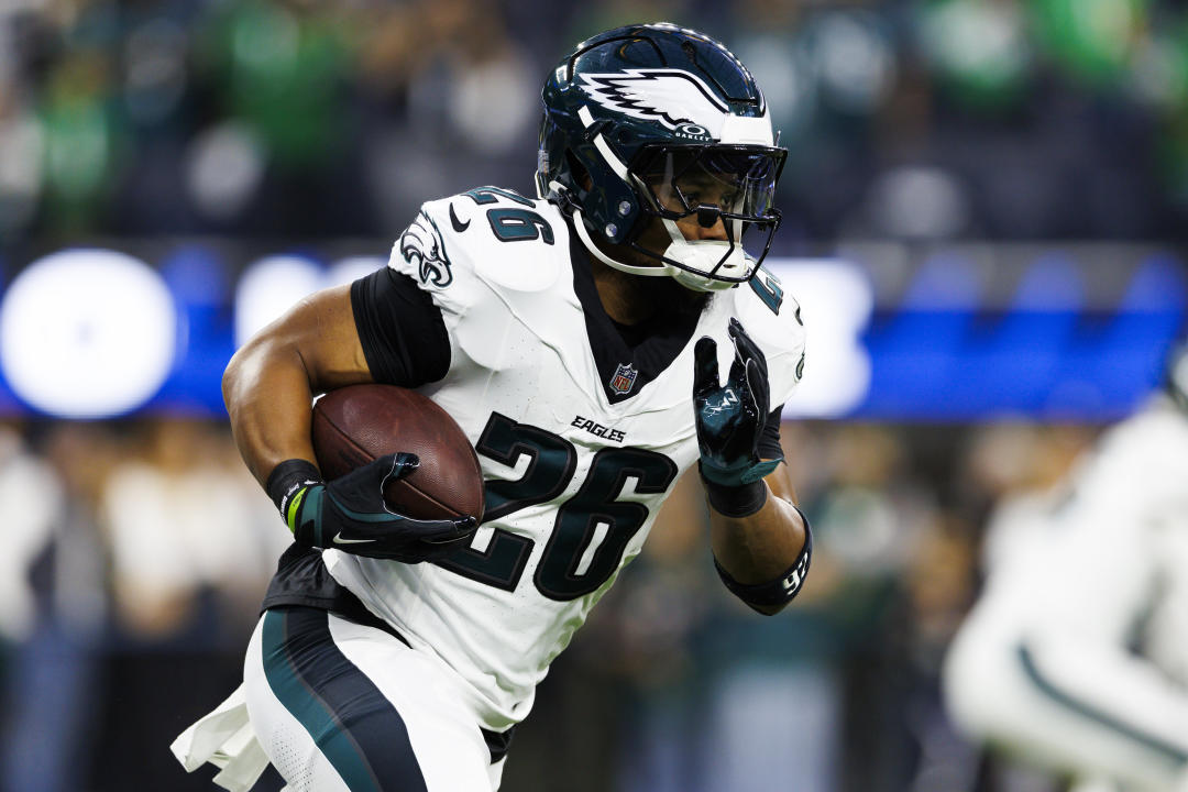 INGLEWOOD, CALIFORNIA - NOVEMBER 24: Saquon Barkley #26 of the Philadelphia Eagles runs with the ball before a game against the Los Angeles Rams at SoFi Stadium on November 24, 2024 in Inglewood, California. (Photo by Ric Tapia/Getty Images)