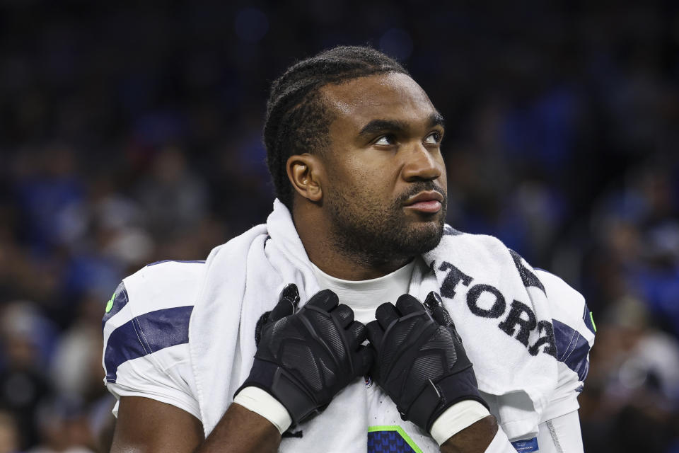 DETROIT, MICHIGAN - SEPTEMBER 30: Tyrel Dodson #0 of the Seattle Seahawks looks on from the sideline during the national anthem prior to an NFL football game against the Detroit Lions at Ford Field on September 30, 2024 in Detroit, Michigan. (Photo by Perry Knotts/Getty Images)