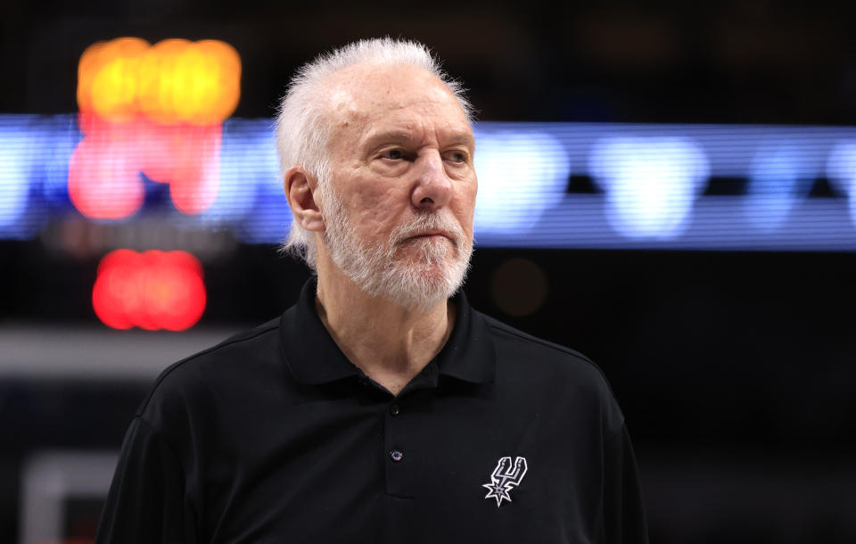 DALLAS, TX - FEBRUARY 14: Head coach Gregg Popovich of the San Antonio Spurs looks on as the Spurs take on the Dallas Mavericks in the first half at American Airlines Center on February 14, 2024 in Dallas, Texas. NOTE TO USER: User expressly acknowledges and agrees that, by downloading and or using this photograph, User is consenting to the terms and conditions of the Getty Images License Agreement. (Photo by Ron Jenkins/Getty Images)