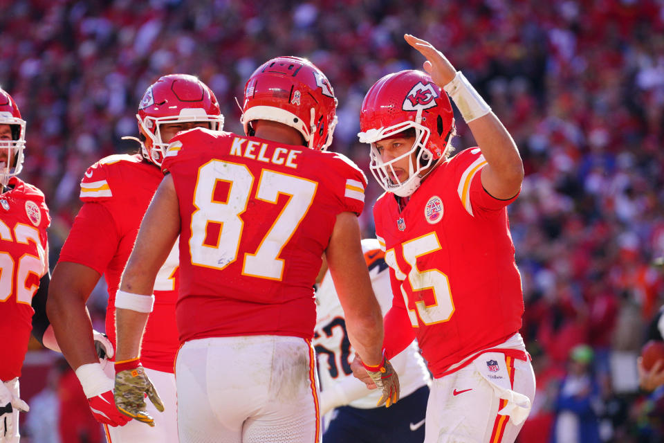 Nov 10, 2024; Kansas City, Missouri, USA; Kansas City Chiefs tight end Travis Kelce (87) celebrates with quarterback Patrick Mahomes (15) after scoring against the Denver Broncos during the first half at GEHA Field at Arrowhead Stadium. Mandatory Credit: Denny Medley-Imagn Images