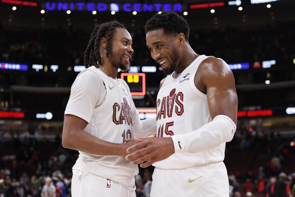 CHICAGO, ILLINOIS - NOVEMBER 11: Darius Garland (L) #10 of the Cleveland Cavaliers and Donovan Mitchell #45 of the Cleveland Cavaliers celebrate their win over the Chicago Bulls at the United Center on November 11, 2024 in Chicago, Illinois. NOTE TO USER: User expressly acknowledges and agrees that, by downloading and or using this photograph, User is consenting to the terms and conditions of the Getty Images License Agreement. (Photo by Geoff Stellfox/Getty Images)