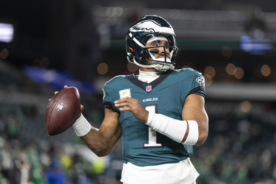 PHILADELPHIA, PENNSYLVANIA - NOVEMBER 14: Jalen Hurts #1 of the Philadelphia Eagles looks to pass prior to an NFL Football game against the Washington Commanders at Lincoln Financial Field on November 14, 2024 in Philadelphia, Pennsylvania. (Photo by Michael Owens/Getty Images)