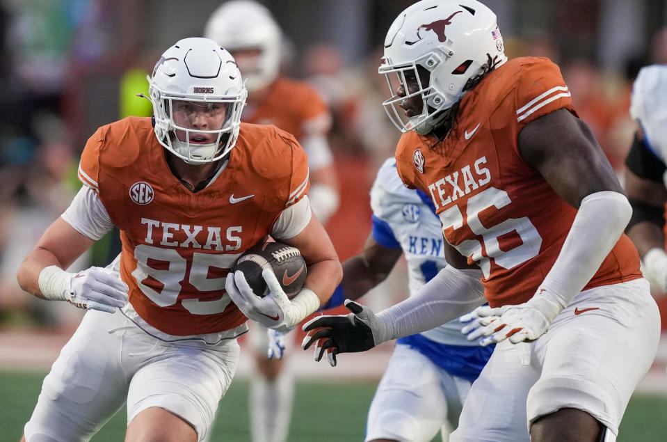 Nov 23, 2024; Austin, Texas, USA; Texas Longhorns tight end Gunnar Helm (85) runs the ball against the Kentucky Wildcats in the fourth quarter at Darrell K Royal Texas Memorial Stadium. Mandatory Credit: Ricardo B. Brazziell/USA TODAY Network via Imagn Images