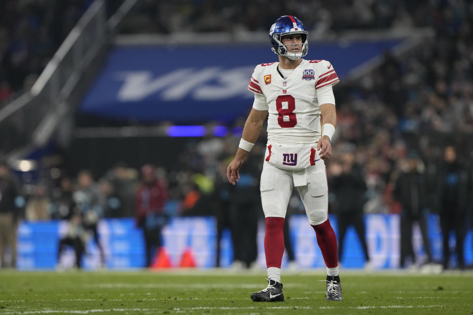 New York Giants quarterback Daniel Jones (8) looks on during an NFL football game against the Carolina Panthers at Allianz Arena in Munich, Germany, Sunday, Nov. 10, 2024. (AP Photo/Steve Luciano)