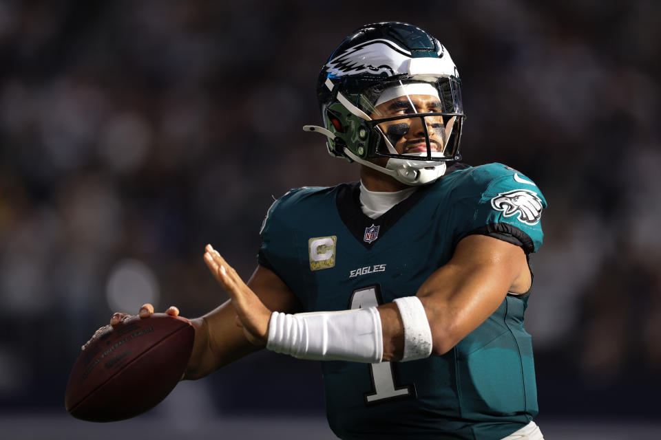 ARLINGTON, TEXAS - NOVEMBER 10: Jalen Hurts #1 of the Philadelphia Eagles throws on the sidelines during the first half against the Dallas Cowboys at AT&T Stadium on November 10, 2024 in Arlington, Texas. (Photo by Sam Hodde/Getty Images)