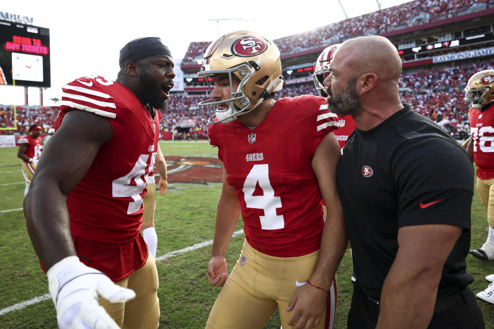 TAMPA, FLORIDA - NOVEMBER 10: Jake Moody #4 of the San Francisco 49ers celebrates after making the game-winning field goal during an NFL football game against the Tampa Bay Buccaneers at Raymond James Stadium on November 10, 2024 in Tampa, Florida. (Photo by Kevin Sabitus/Getty Images)