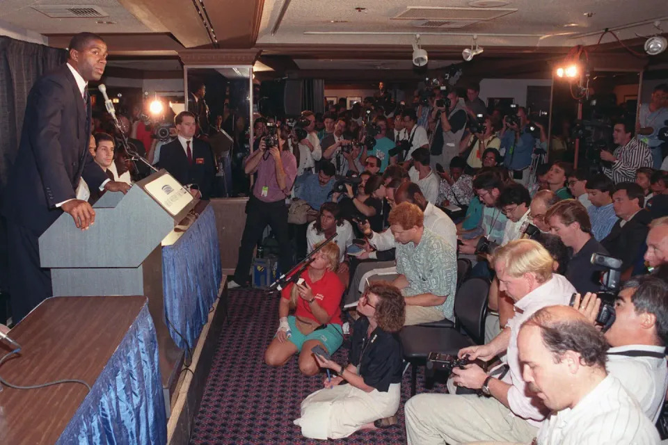 Magic announces his retirement to a room full of reporters at the L.A. Forum. (Craig Fuji/AP Photo)