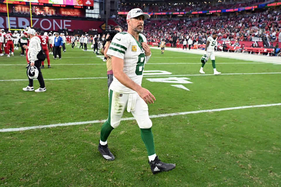 Rodgers walks off the field after last Sunday's loss to the Cardinals. (Norm Hall/Getty Images)