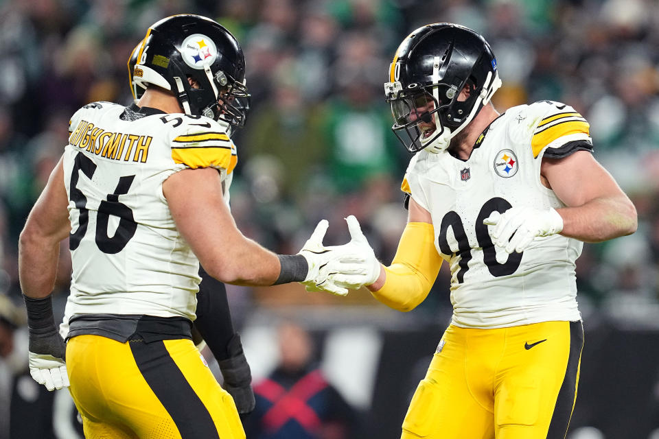 PHILADELPHIA, PENNSYLVANIA - DECEMBER 15: Alex Highsmith #56 celebrates with T.J. Watt #90 of the Pittsburgh Steelers after a sack against the Philadelphia Eagles during the first half at Lincoln Financial Field on December 15, 2024 in Philadelphia, Pennsylvania. (Photo by Mitchell Leff/Getty Images)