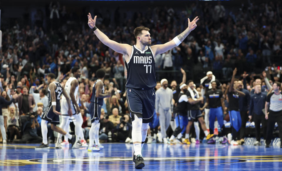 Dec 3, 2024; Dallas, Texas, USA; Dallas Mavericks guard Luka Doncic (77) reacts during the fourth quarter against the Memphis Grizzlies at American Airlines Center. Mandatory Credit: Kevin Jairaj-Imagn Images