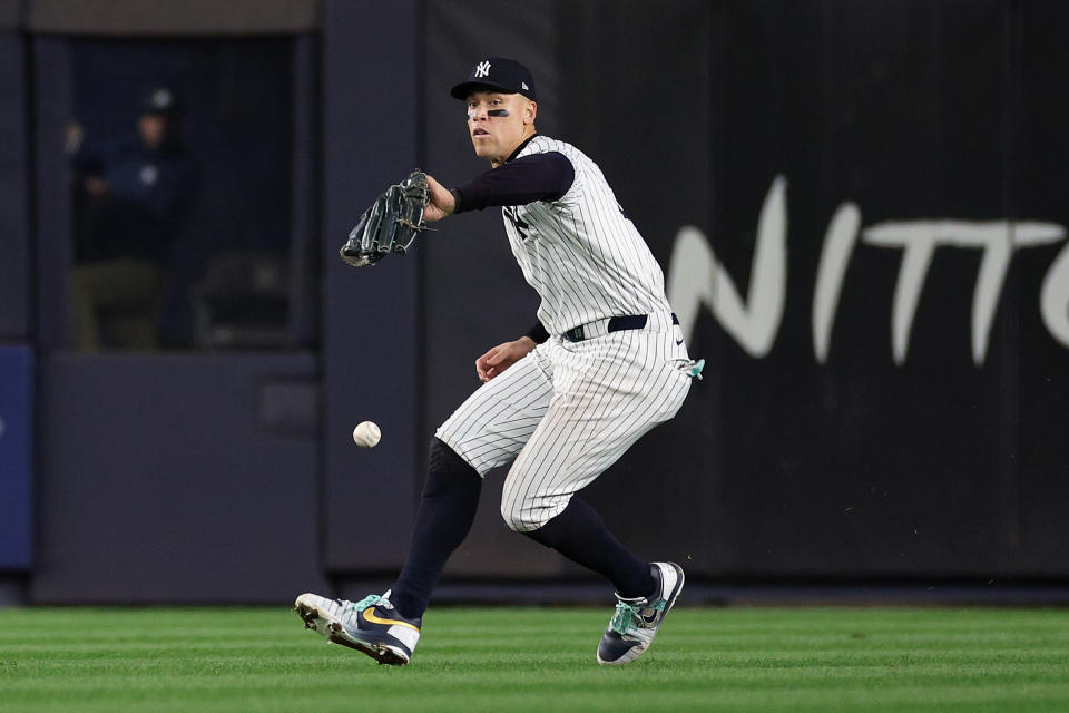 NEW YORK, NEW YORK - OCTOBER 30: Aaron Judge #99 of the New York Yankees drops a routine fly ball hit by Tommy Edman #25 of the Los Angeles Dodgers during the fifth inning of Game Five of the 2024 World Series at Yankee Stadium on October 30, 2024 in the Bronx borough of New York City. (Photo by Elsa/Getty Images)