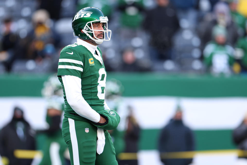 EAST RUTHERFORD, NEW JERSEY - DECEMBER 22: Aaron Rodgers #8 of the New York Jets on the field before the game against the Los Angeles Rams at MetLife Stadium on December 22, 2024 in East Rutherford, New Jersey. (Photo by Emilee Chinn/Getty Images)