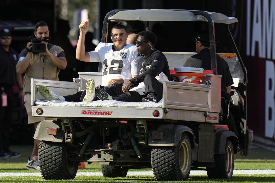 Las Vegas Raiders quarterback Aidan O'Connell left Sunday's game with air cast on his left leg. (AP Photo/Chris O'Meara)