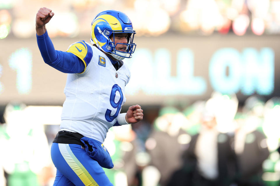 EAST RUTHERFORD, NEW JERSEY - DECEMBER 22: Matthew Stafford #9 of the Los Angeles Rams celebrates a touchdown by teammate Kyren Williams #23 during the second quarter against the New York Jets at MetLife Stadium on December 22, 2024 in East Rutherford, New Jersey. (Photo by Luke Hales/Getty Images)