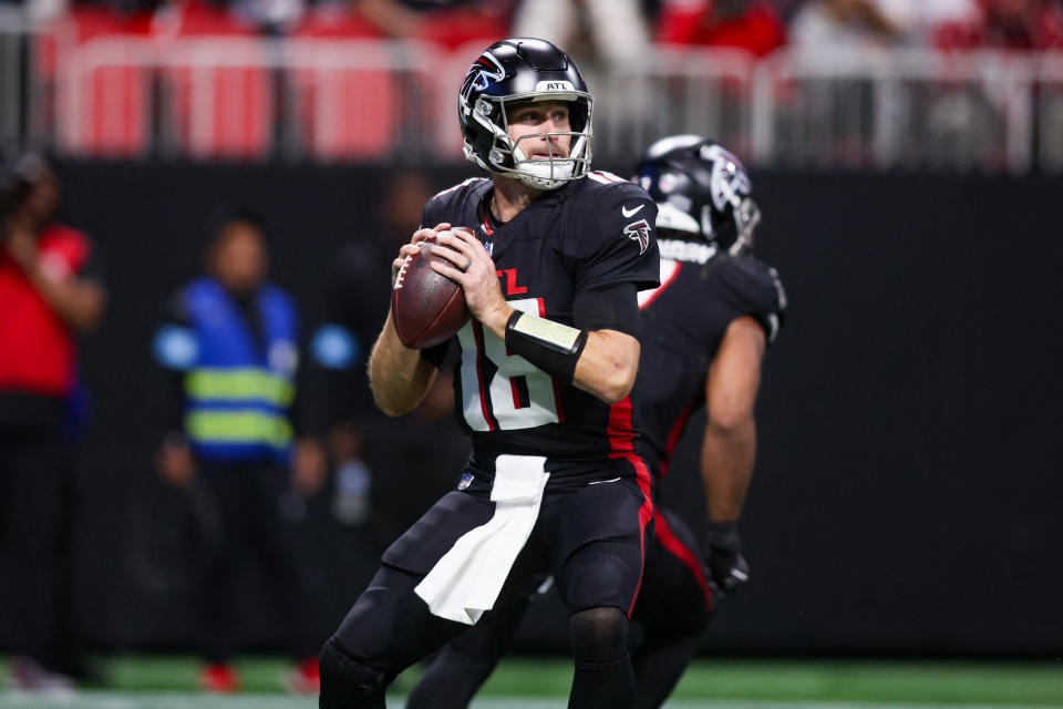 Dec 1, 2024; Atlanta, Georgia, USA; Atlanta Falcons quarterback Kirk Cousins (18) drops back to pass against the Los Angeles Chargers in the fourth quarter at Mercedes-Benz Stadium. Mandatory Credit: Brett Davis-Imagn Images