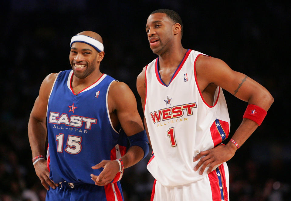 Vince Carter and Tracy McGrady, seen here as All-Stars in 2005, are now co-owners of the Buffalo Bills. (Ronald Martinez/Getty Images)